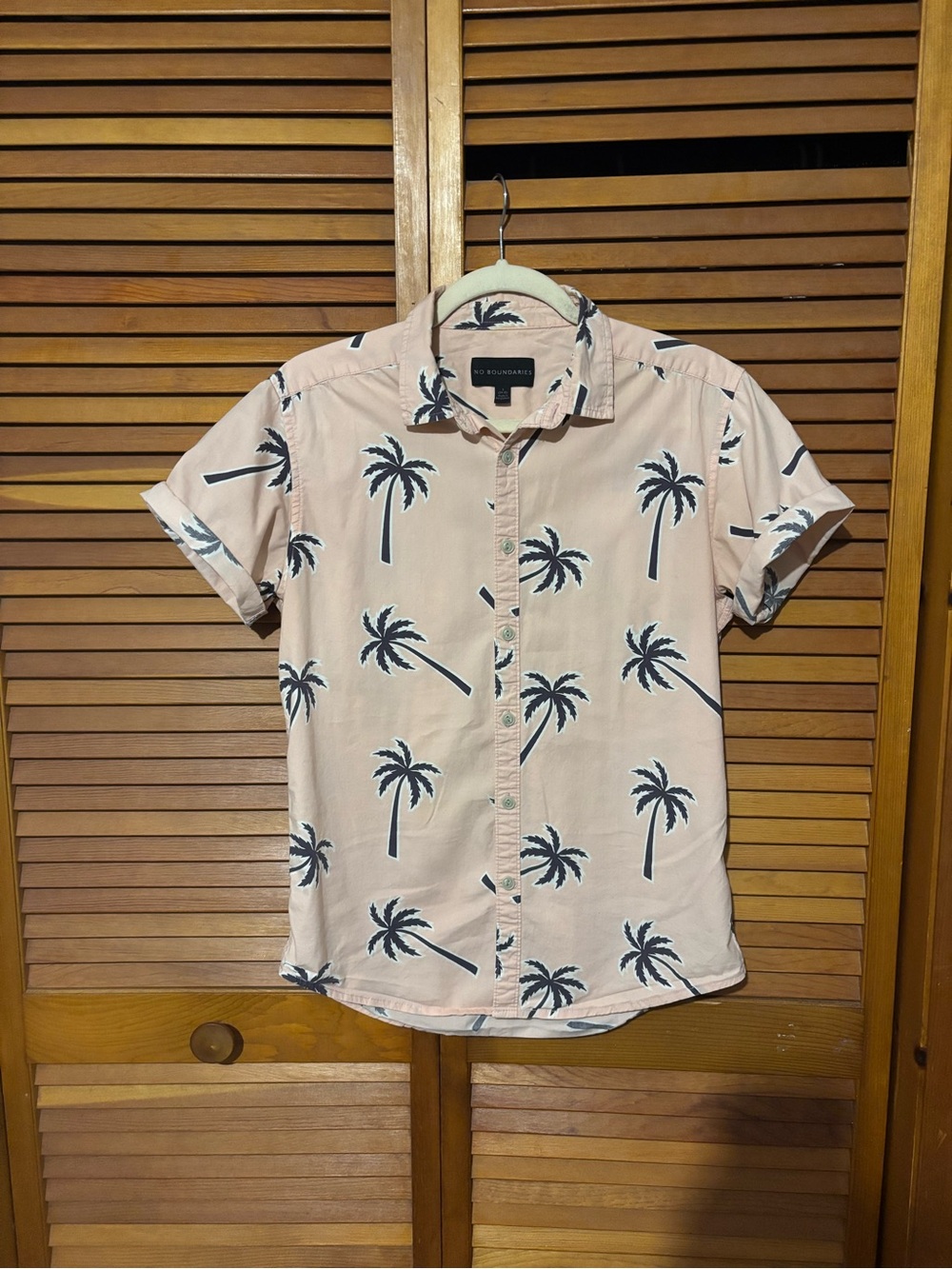 100% cotton palm tree button up. Styled in the 2nd slide
